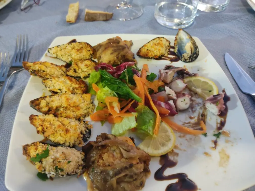 Plate of food at fish restaurant in Italy
